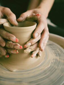 Hands expressing creative art through hands-on crafting and expression